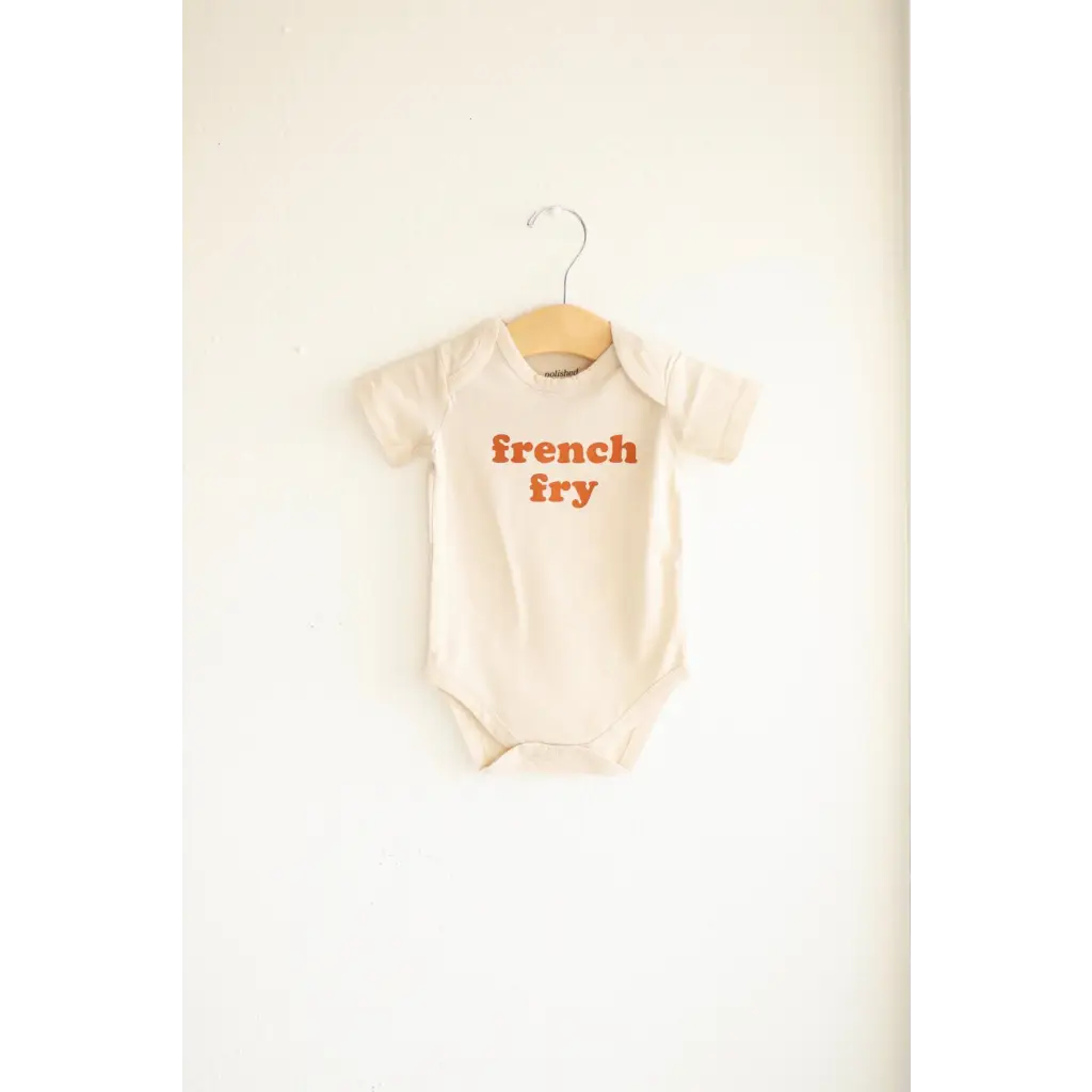 White baby onesie with french fry text in orange, made from organic cotton, 3mo fits closer