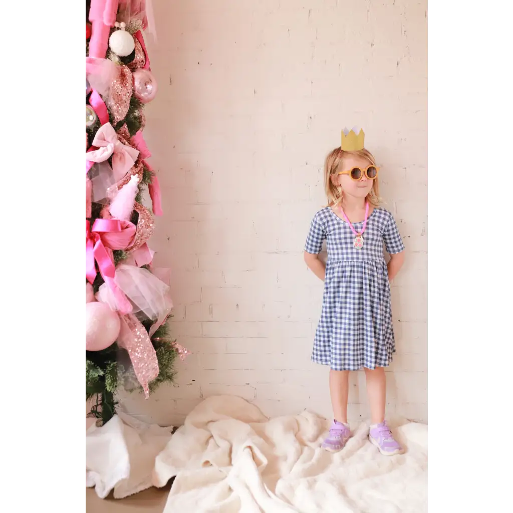 Blue and white gingham bamboo twirl dress with gold crown