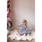 Vintage rotary phone with gold accents on gingham bamboo twirl dress