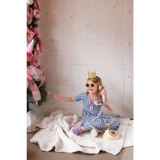 Vintage rotary phone with gold accents on gingham bamboo twirl dress