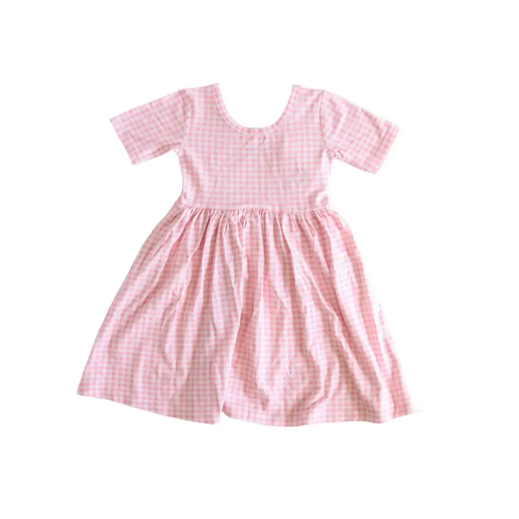 Cute pink and white gingham dress with short sleeves, perfect for stylish kids