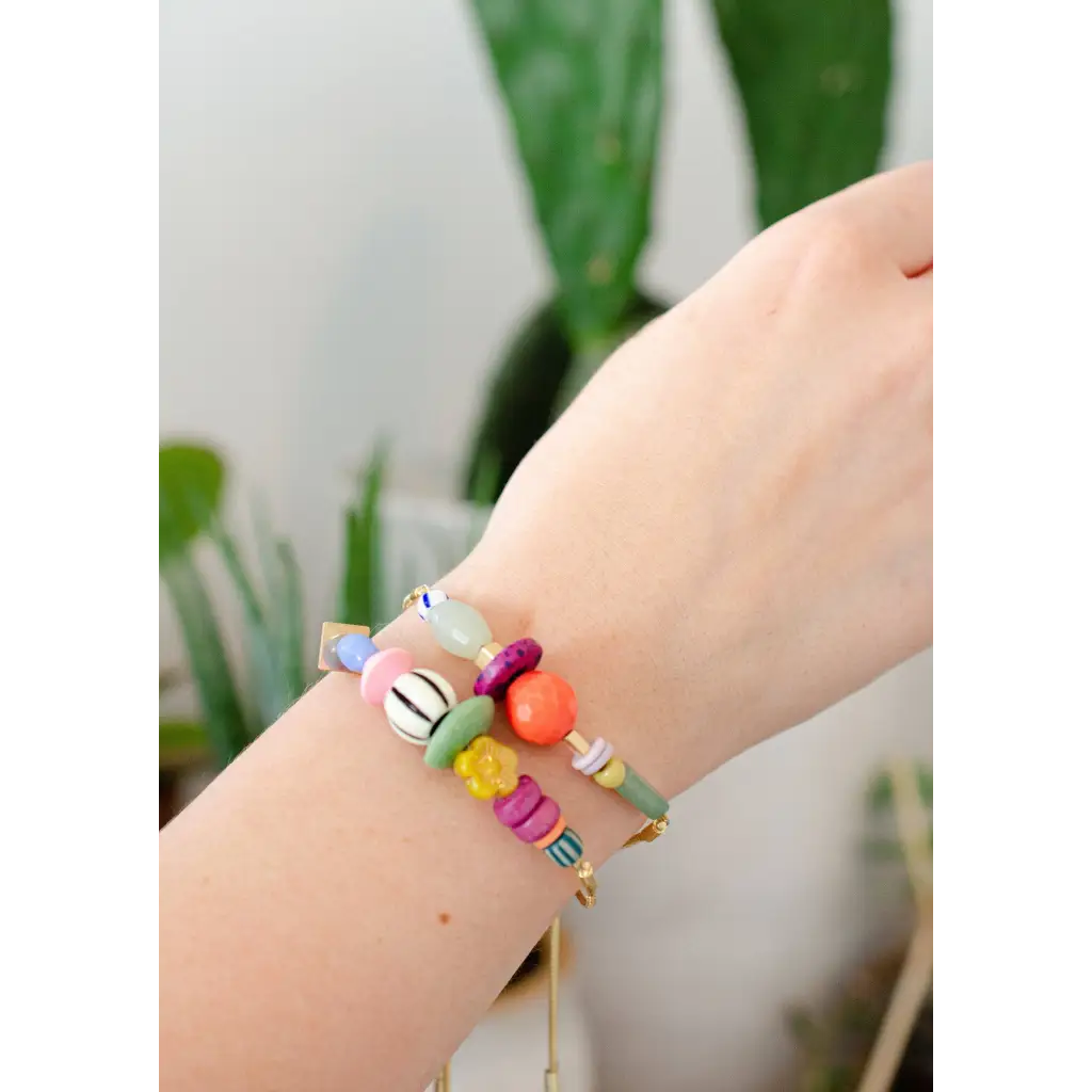 Gold pull-tie beaded bracelet in colorful pastel beads