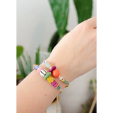 Gold pull-tie beaded bracelet in colorful pastel beads