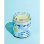 Good Baby Chapped Cheeks balm jar with daisy label, polished prints for moms