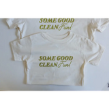 White kids tee with green text saying Some Good Clean Fun for playful style