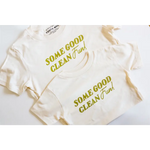 White kids tee with green text saying Some Good Clean Fun, perfect for playful adventures