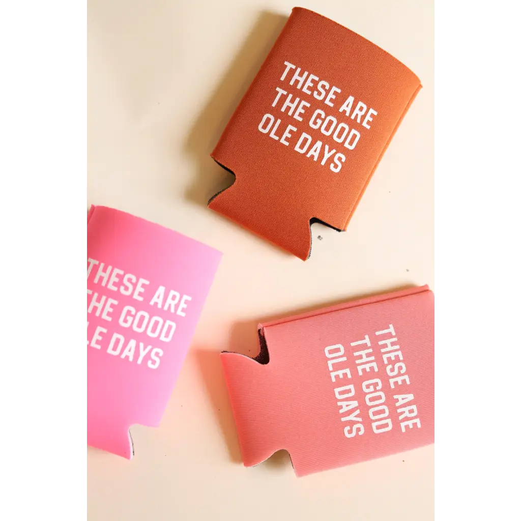 Three vibrant Good Ole Days koozies in orange and pink for chill vibes and fun times