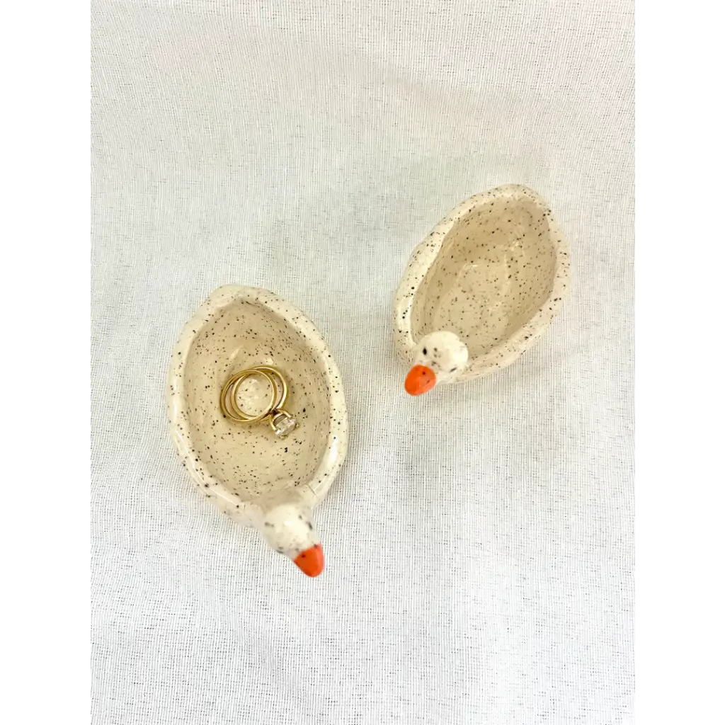 Creamy speckled duck-shaped goose ring dish with orange beak