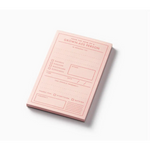 Pink notepad made of dyed paper with polished prints from the Grown-Ass Person Memo Pad collection