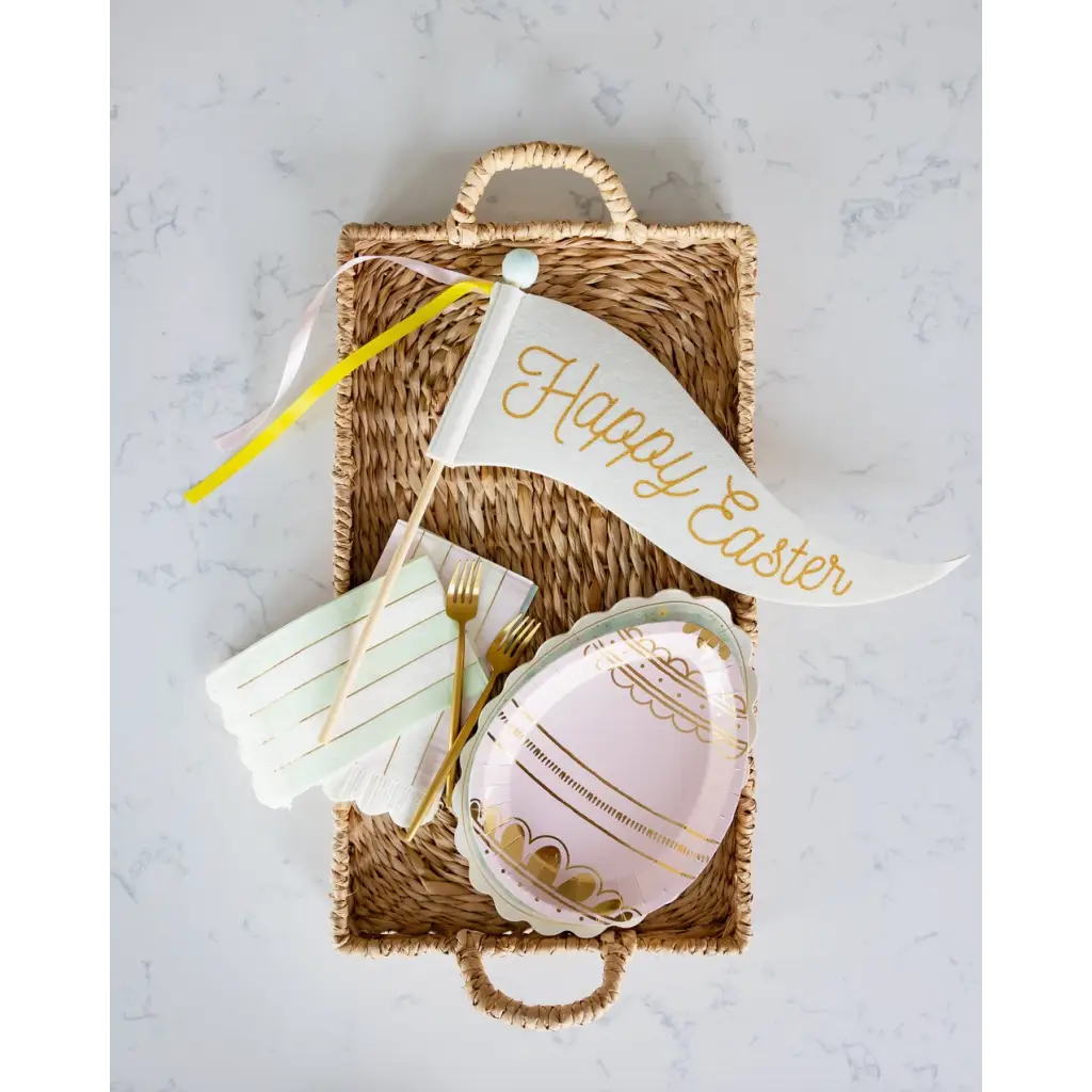Easter-themed party supplies in a basket with Happy Easter Felt Pennant Decoration