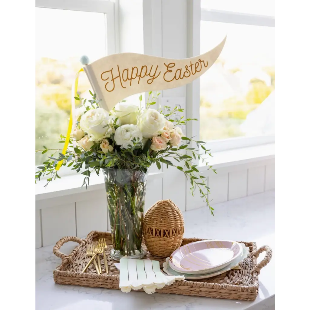 Easter-themed floral centerpiece with a Happy Easter Felt Pennant decoration