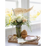 Easter-themed floral centerpiece with a Happy Easter Felt Pennant decoration