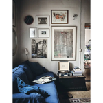 Vintage black and cream Happy Homes record player on wooden chest