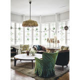 Happy Homes vibrant green leaf armchair with ruffled skirt