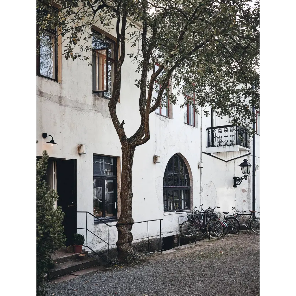 Happy Homes white weathered two-story building with balcony polished prints