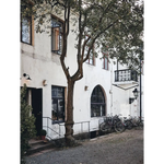 Happy Homes white weathered two-story building with balcony polished prints