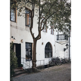 Happy Homes white weathered two-story building with balcony polished prints