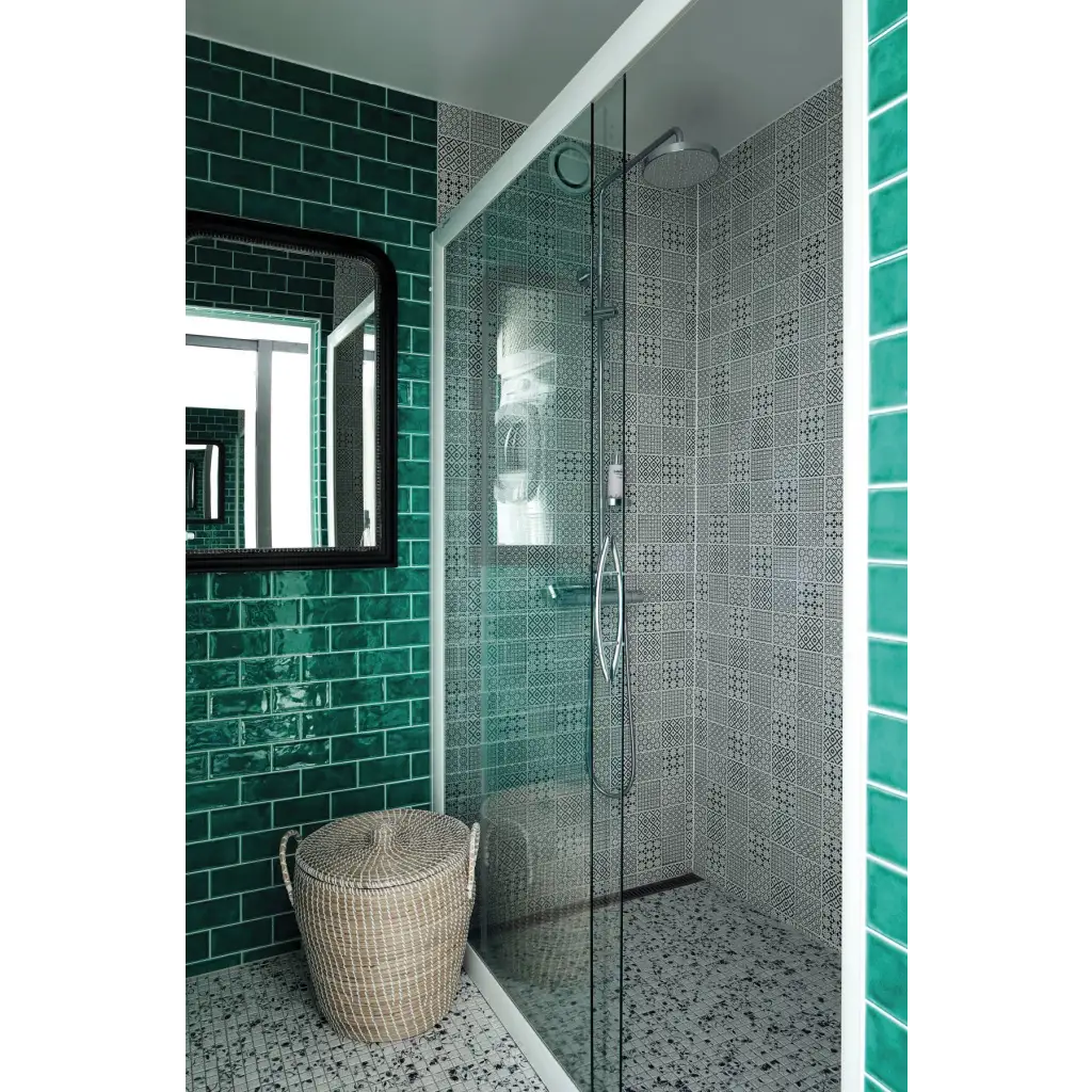 Happy Homes round woven wicker laundry basket on speckled floor