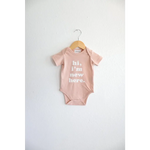 Cute pink baby onesie made from organic cotton featuring polished prints for stylish looks