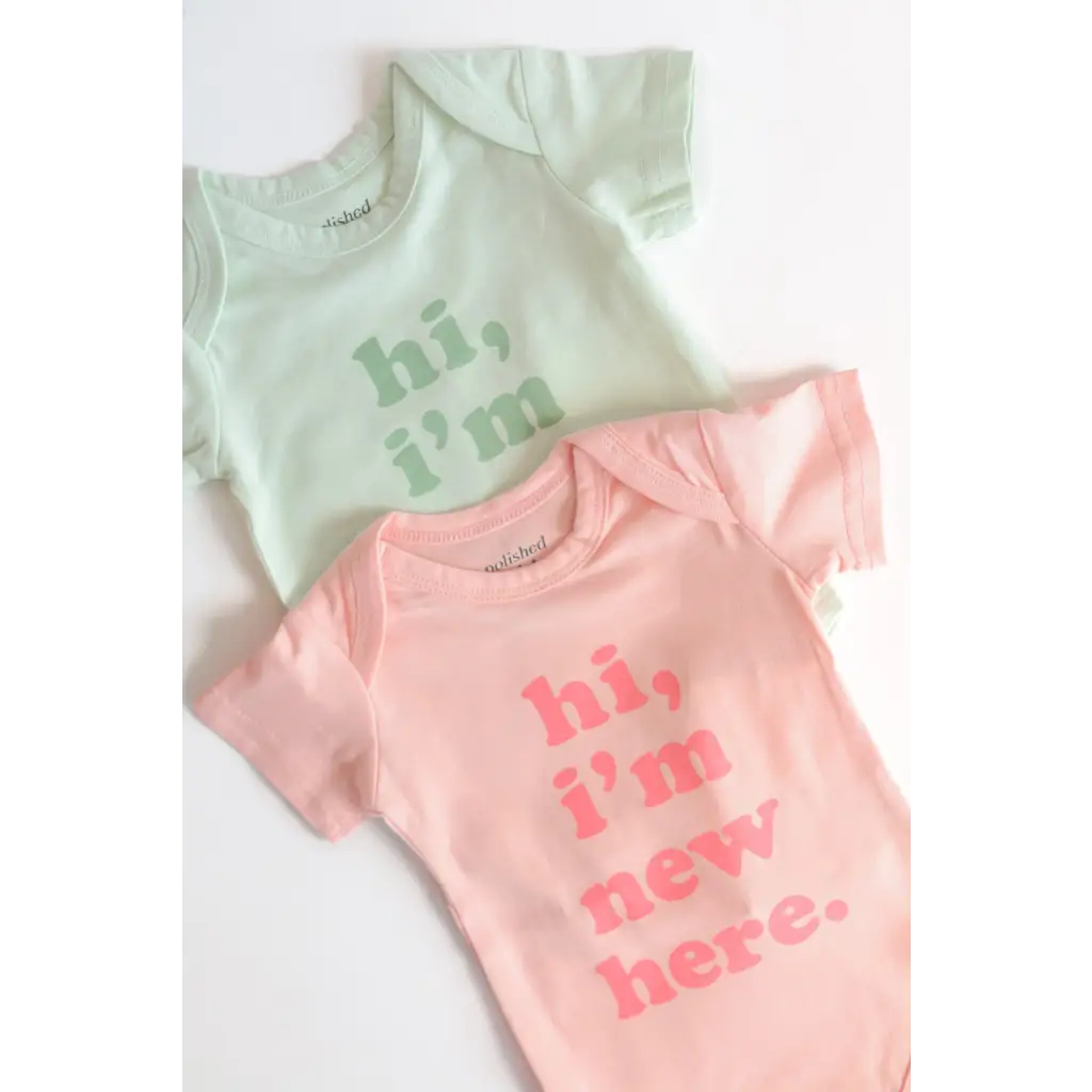 Mint Green and Pink Organic Cotton Baby Onesies saying hi, I’m new here