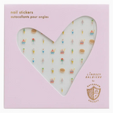 Heart-shaped window with cute Ice Cream Dreams nail stickers featuring sweet treats design