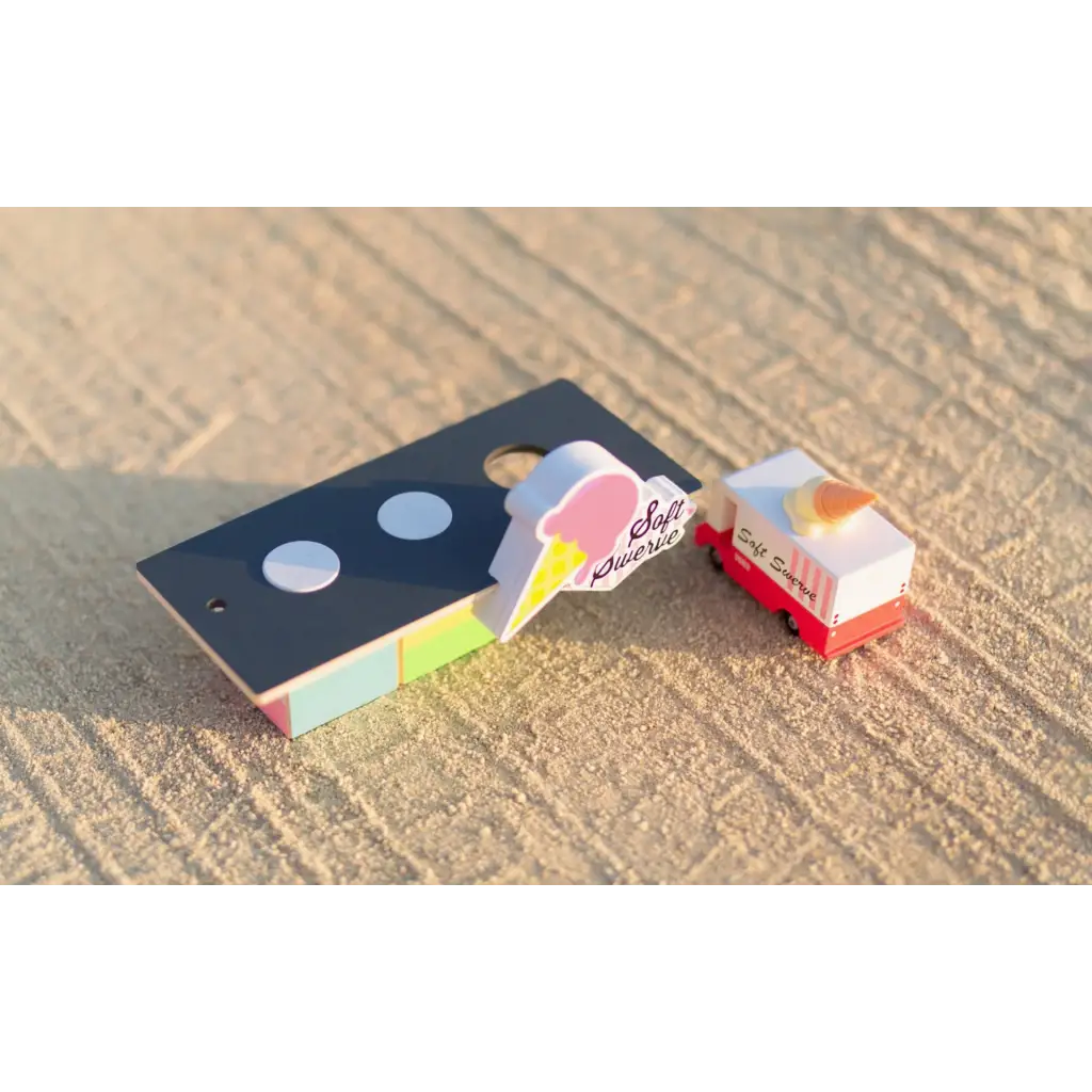 Colorful domino-style ice cream holder for your Roadside Shack Business on dark surface