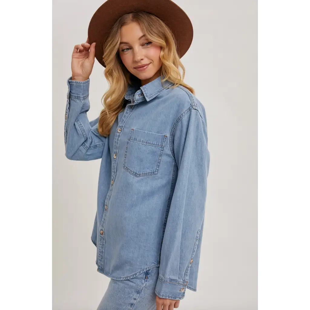 Light blue denim button-up shirt with chest pockets for stylish womens clothes