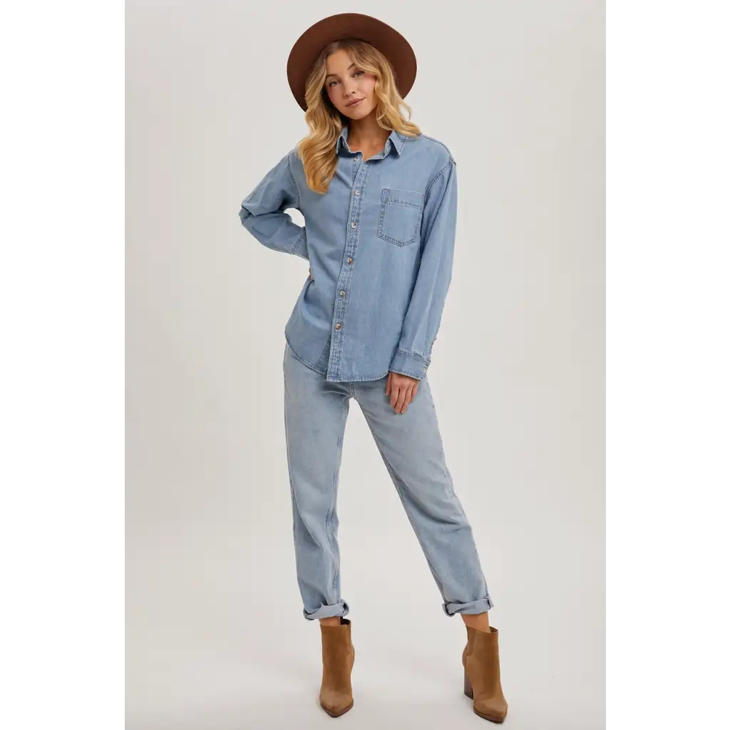 Light blue denim button-up shirt with jeans and brown boots from Jenny stylish womens clothes