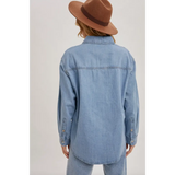 Light blue denim button-up shirt with brown fedora, perfect stylish womens clothes