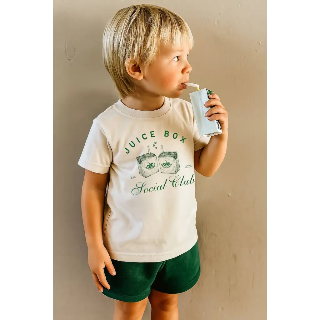 Toddler cream Juice Box Social Club t-shirt with green Juice Box graphic for kids