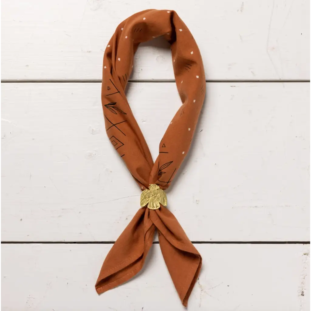 Brown patterned neckerchief with gold slide from Keep Going Cotton Voile Bandana, perfect for stylish womens clothes and moms