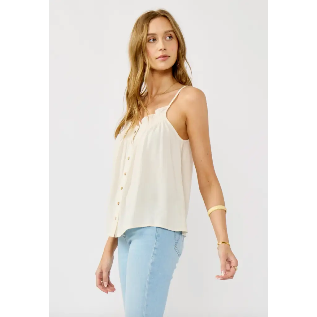 Women’s cream-colored spaghetti strap button-down tank top from Kendal Smocked collection