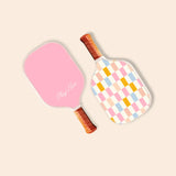 Two colorful pickle ball paddles for kids featuring a fun sherbet checkered design