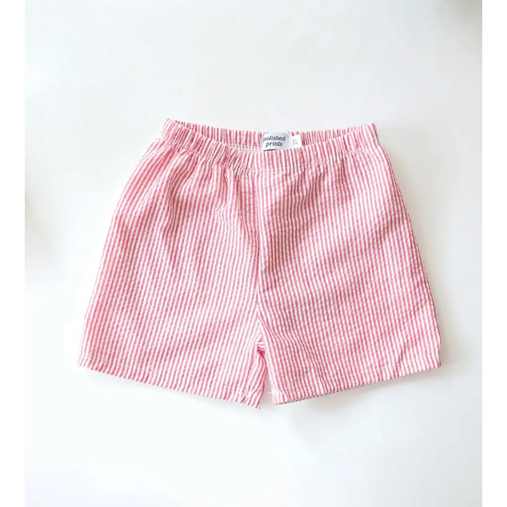 Kids striped pull-on shorts in pink and white with classic nautical style and seersucker-textured fabric