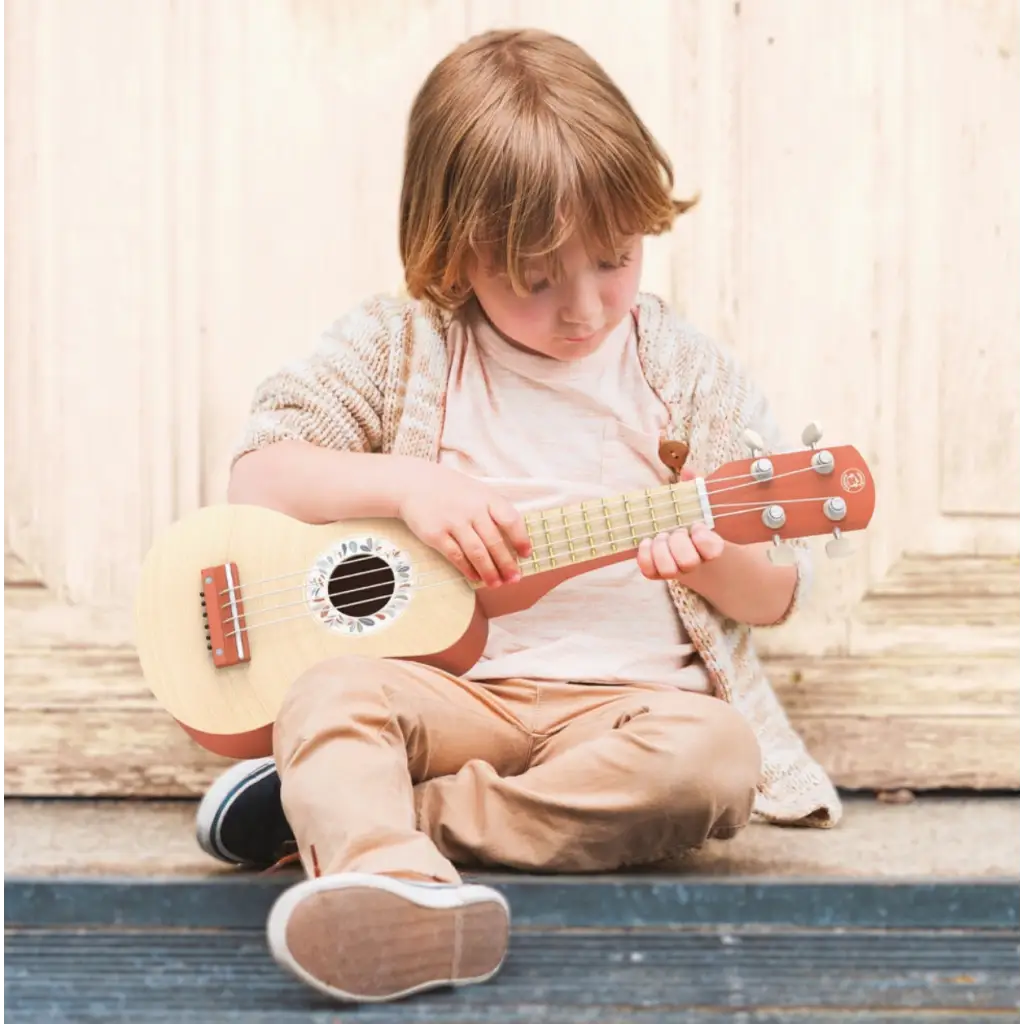 Colorful Kids Soft Nylon Four String Toy Ukulele with Orange Strings for fun music play