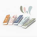 Five pastel wooden harmonicas ready for melodic magic and fun in every tune