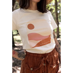 Golden Relaxed Graphic Tee featuring minimalist pink desert landscape and sun design