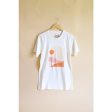 Golden Relaxed Graphic Tee featuring a minimalist orange sun and landscape design