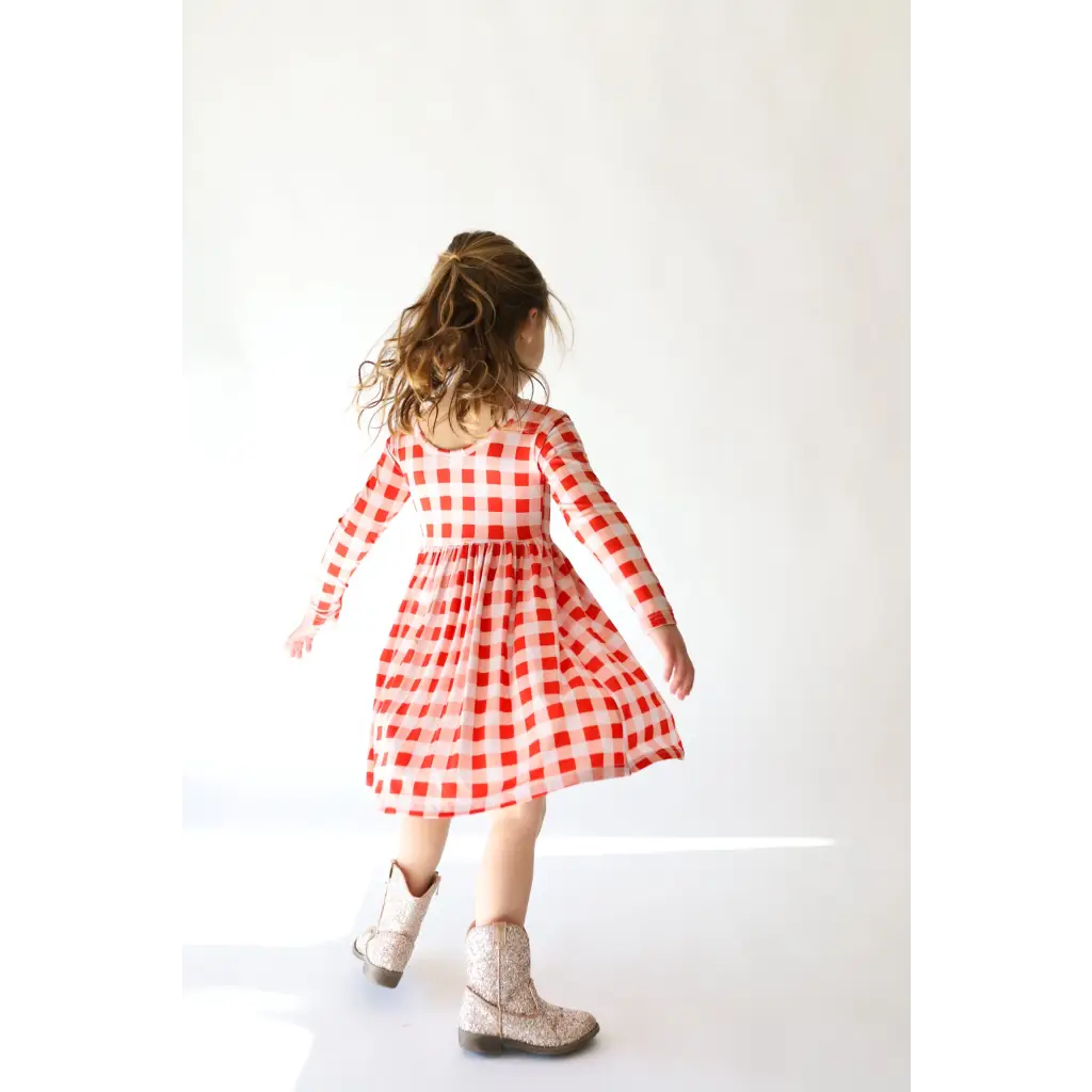 Red and white gingham Kit Plaid Dress for Girls featuring long sleeved twirl skirt