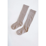 Cute knee high socks in ribbed beige perfect for babies and kids’ outfits