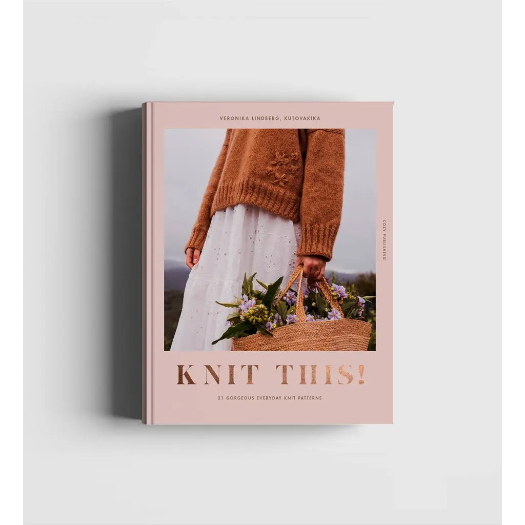 Pink Knit This! book with orange knit sweater, stylish womens clothes patterns