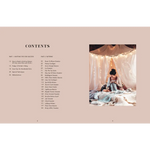 Cozy cream knit blanket on lap in tent from Knit This! knit patterns book