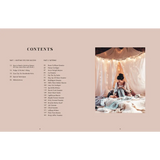 Cozy cream knit blanket on lap in tent from Knit This! knit patterns book