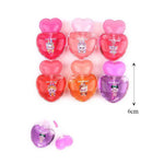 Heart-shaped Labubu Bunny lip gloss bottle set in vibrant reds and pinks