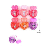 Heart-shaped Labubu Bunny lip gloss bottle set in vibrant reds and pinks