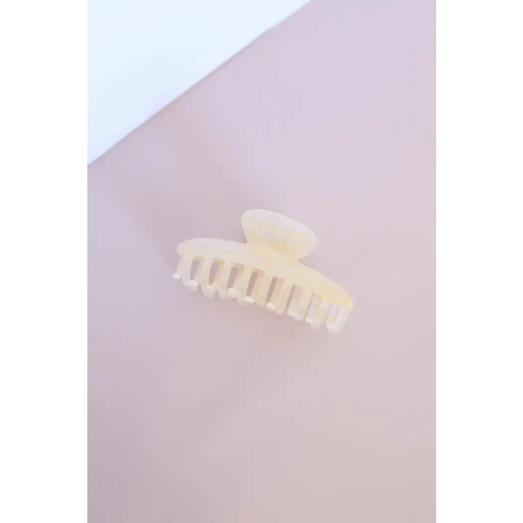 Cream large claw clip with teeth, the ultimate favorite hair accessory for stylish looks