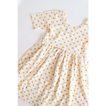 White Lemon Shake Up All Day Twirl Dress for Kids with tiny orange floral print