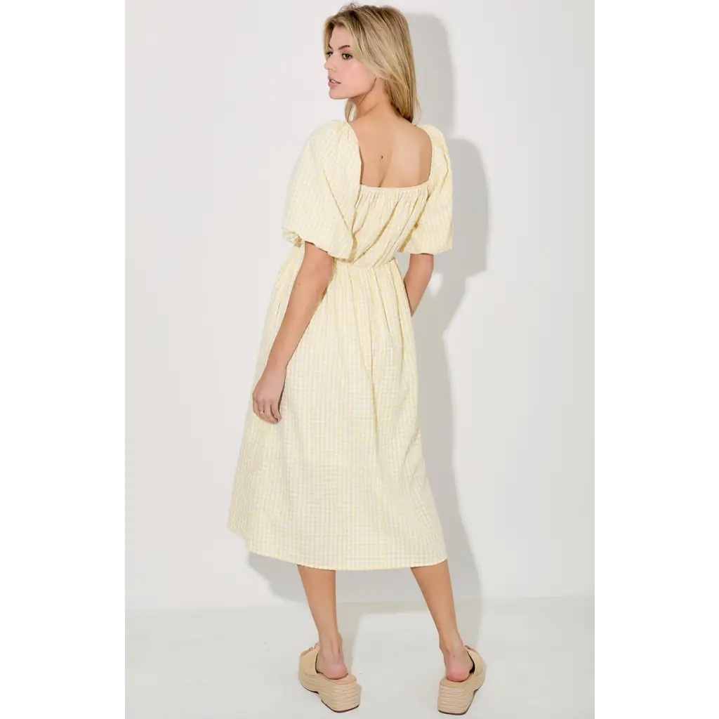Yellow gingham midi dress from Lemon Meadow Gingham collection perfect for summer casuals