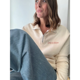 Cream-colored embroidered pullover with Less is More design for stylish sports sweatshirts