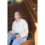 Casual vibe of Cool Cream Embroidered Pullover with jeans and coffee on stairs